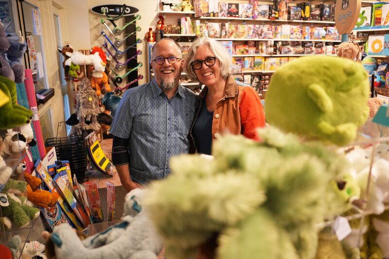 FILE - Co-owners Dean Smith, left, and Joanne Farrugia pose for a photograph in JaZams, one of their toy stores Friday, June 27, 2025, in Princeton, N.J. (AP Photo/Matt Slocum)