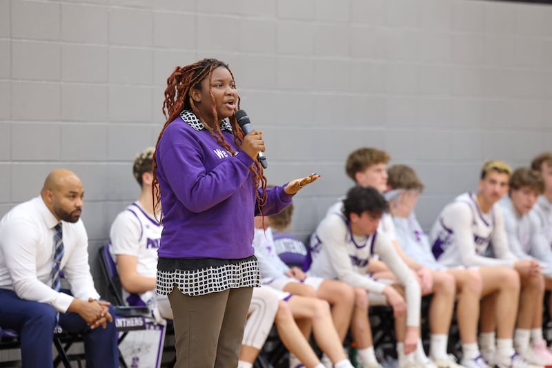 Harbor House prevention advocate Stephanie speaks to the crowd as Manteno and Bishop McNamara hosted Safe Harbor Night, collecting donations during their game to benefit Harbor House on Tuesday, Jan. 13, 2026.