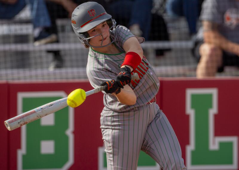 Makenzie Chamberlain connects with a pitch from Kaneland Highschool during the game on April 28, 2025 at the LaSalle Peru High School Sports Complex.