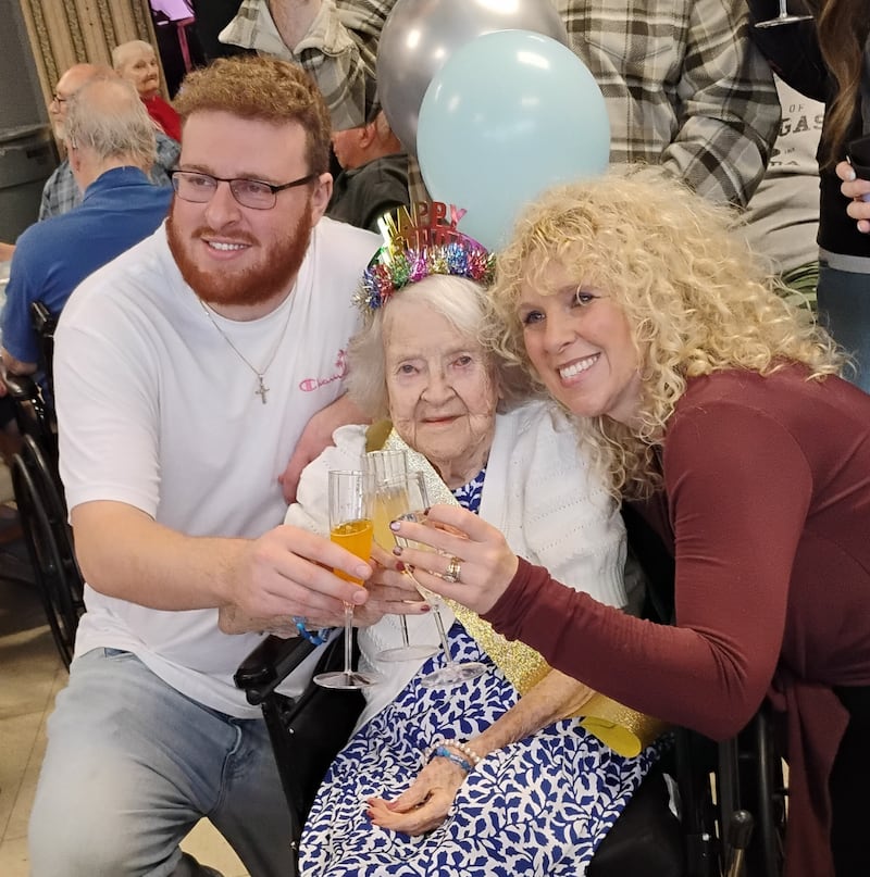 Helen Frank at her 105th birthday party Tuesday, May 12, 2026 at Crescent Care in Elgin, flanked by her great-grandson, Zack Stringer and her granddaughter Melissa Stringer.