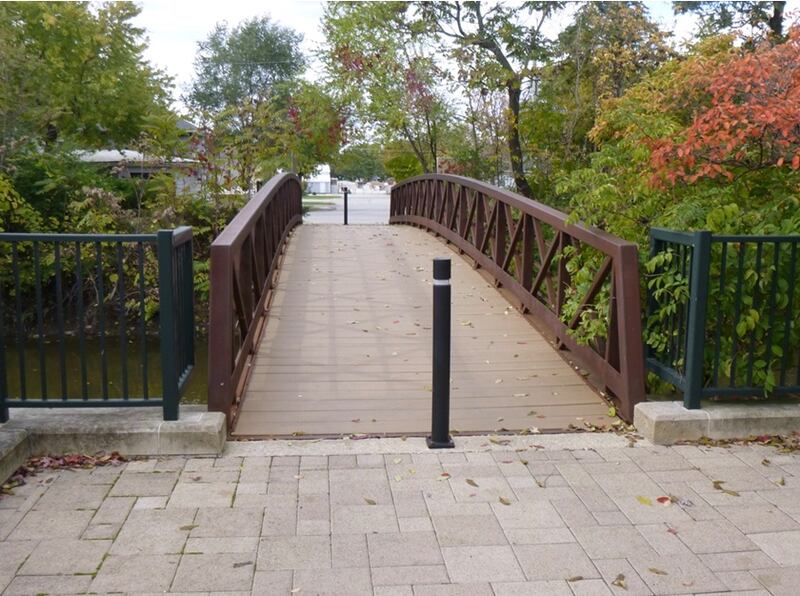 Looking north at the 8th Street Gaylord Building pedestrian bridge over the old I & M Canal in downtown Lockport.