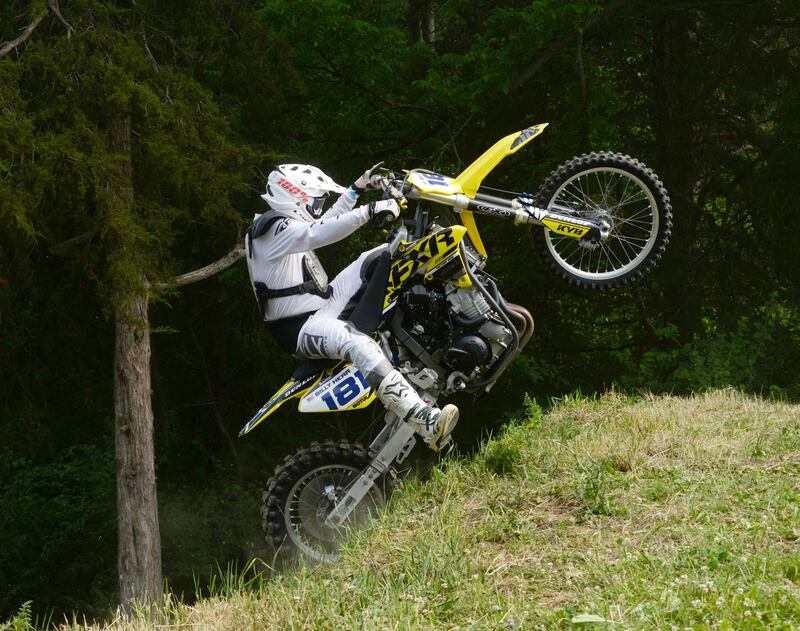 Billy Herr of Des Moines, Iowa, clears the hill at the Rock River Riders Motorcycle Club's Father Day Hill Climb on Sunday, June 15, 2025.