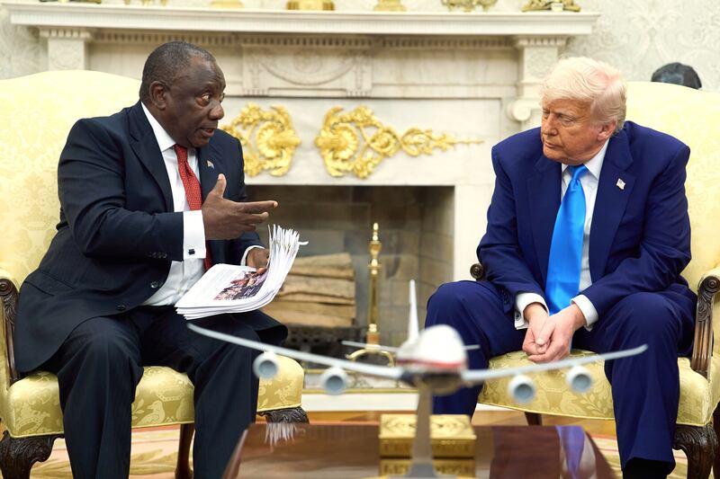 President Donald Trump meets South Africa's President Cyril Ramaphosa in the Oval Office of the White House, Wednesday, May 21, 2025, in Washington. (AP Photo/Evan Vucci)