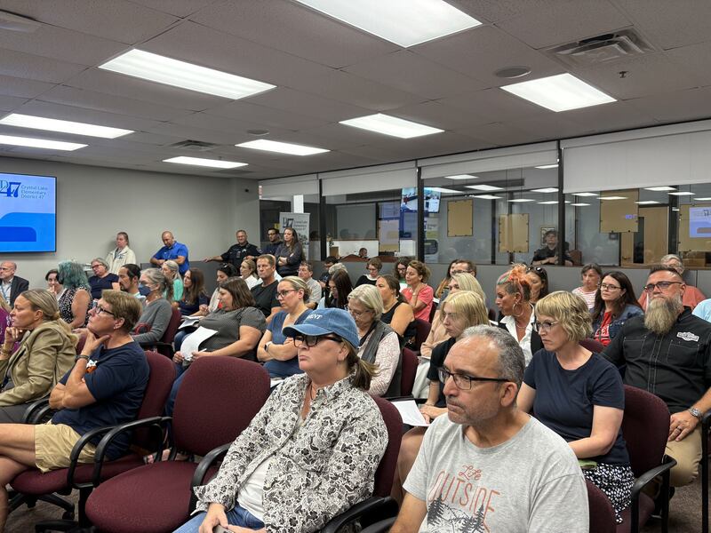 Audience members listen at a Crystal Lake District 47 board meeting Sept. 15, 2025.