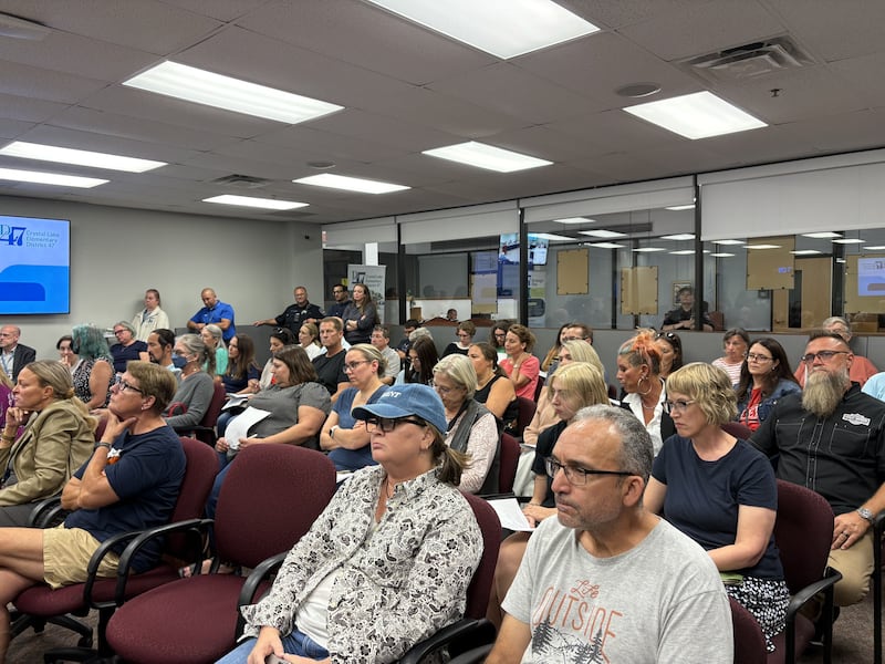 Audience members listen at a Crystal Lake District 47 board meeting Sept. 15, 2025.