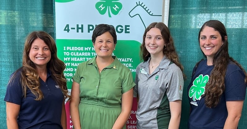 Lindsay Young (2nd from left) was presented a 2025 Illinois State 4-H Alumni Award. Karla Belzer (left), Whiteside County Extension Director, Madison Krum, Illinois 4-H Youth Leadership Team Member, and Allie Johnston (right), Whiteside County 4-H Coordinator, were on hand to congratulate Young.