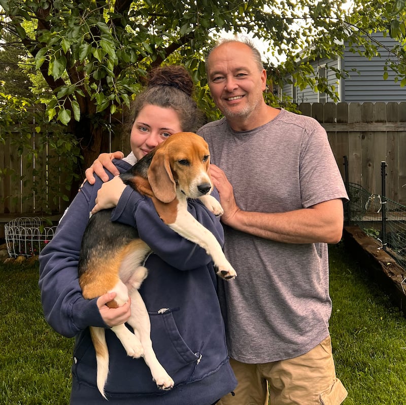 Cary resident Paul Barthel (right) and his daughter Angelina with Scout.