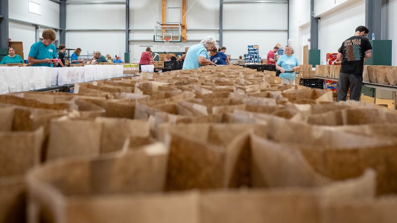 The United Way of Whiteside County is launching the Let's Feed Our Children: Emergency Winter Program. The group and volunteers work on meal packing during the summer version of the program.