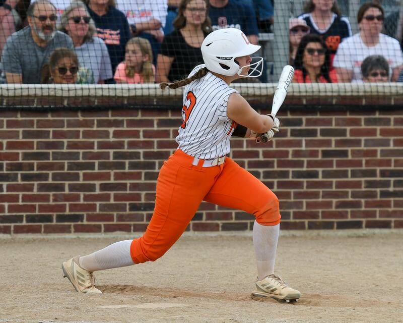 Oswego's Kennedy Gengler (9) watches the ball after getting a hit allowing her to get a double during the game on Tuesday June 3, 2025, that allowed two runs to score in the sectional semifinal game held at Oswego High School.