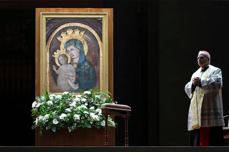 FILE - Cardinal Robert Francis Prevost, Prefect of the Dicastery for Bishops, leads the recitation of the Holy Rosary for Pope Francis' health in St Peter's Square at the Vatican, March 3, 2025. (AP Photo/Kirsty Wigglesworth, File)