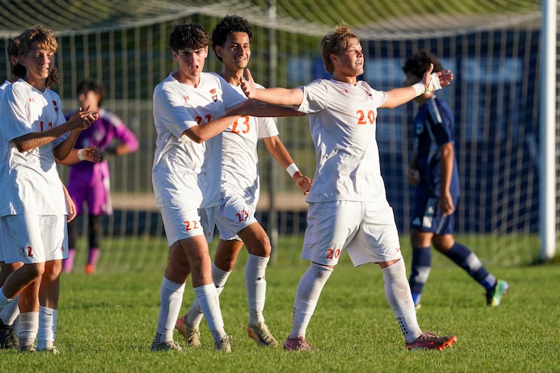 Oswego’s Ryan Maveus (20) reacts after scoring a goal against Oswego East during a Southwest Prairie Conference game at Oswego East High School on Thursday, Sept. 25, 2025.