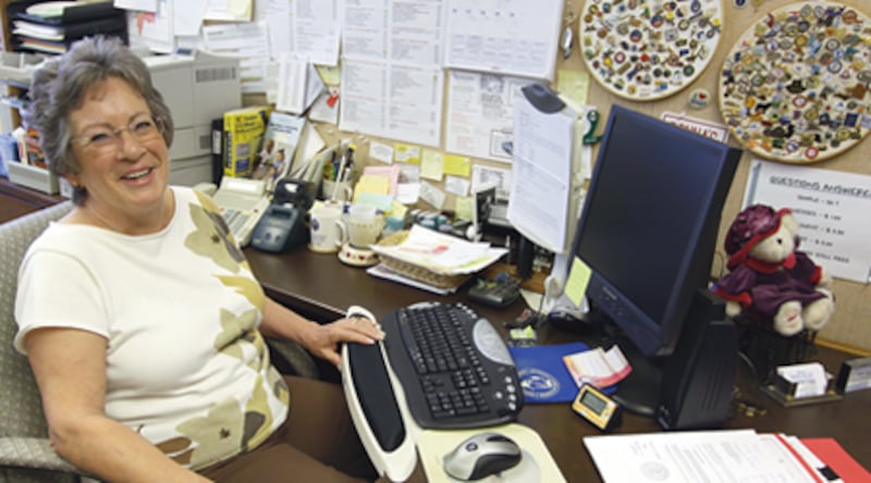 DeKalb City Clerk Donna Johnson sits in her office Friday, which is in the DeKalb Municipal Building on South Fourth Street in DeKalb. Johnson retires next week after being involved for more than 30 years in city government.