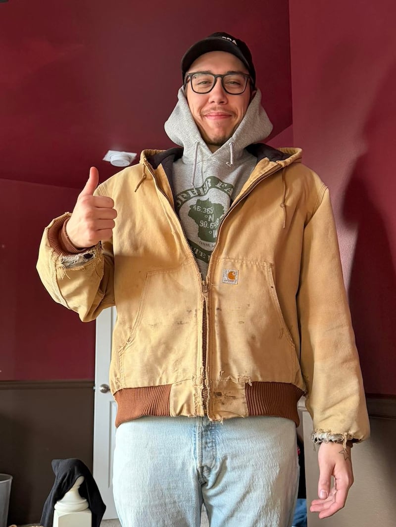 Brian Butler, of Spring Grove, posed in his Carhartt jacket on Saturday, Feb. 7, 2026. He got the coat back after more than a year, after his then-girlfriend gave it to another woman on New Year's Eve 2024.