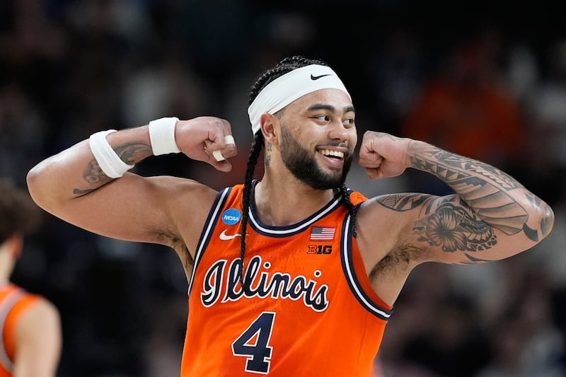 Illinois guard Kylan Boswell (4) celebrates a basket during the first half in the second round of the NCAA college basketball tournament against Virginia Commonwealth, Saturday, March 21, 2026, in Greenville, S.C. (AP Photo/Brynn Anderson)