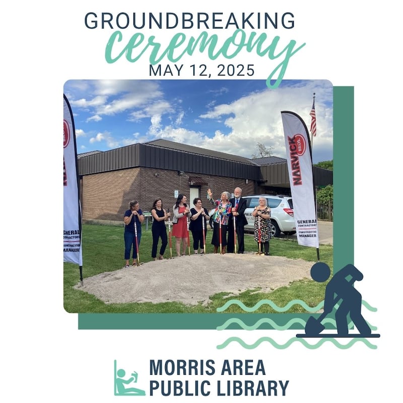Members of the Morris Area Public Library Board prepare to break ground on its new addition.