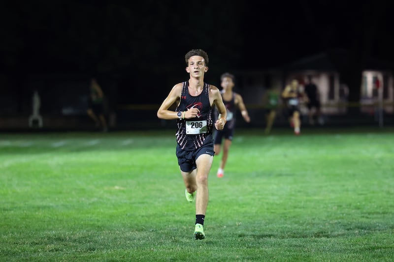Bradley-Bourbonnais' Brayden Domont nears the finish line in first place during the All-City cross country meet at Bishop McNamara on Wednesday, Sept. 17, 2025.