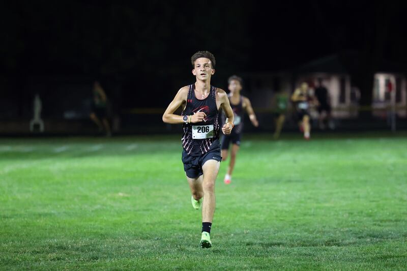 Bradley-Bourbonnais' Brayden Domont nears the finish line in first place during the All-City cross country meet at Bishop McNamara on Wednesday, Sept. 17, 2025.
