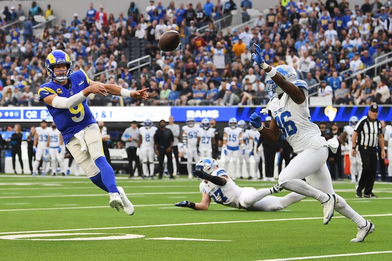 Los Angeles Rams quarterback Matthew Stafford (9) throws a pass during the first half of an NFL football game against the Detroit Lions, Sunday, Dec. 14, 2025, in Inglewood, Calif. (AP Photo/Katie Chin)