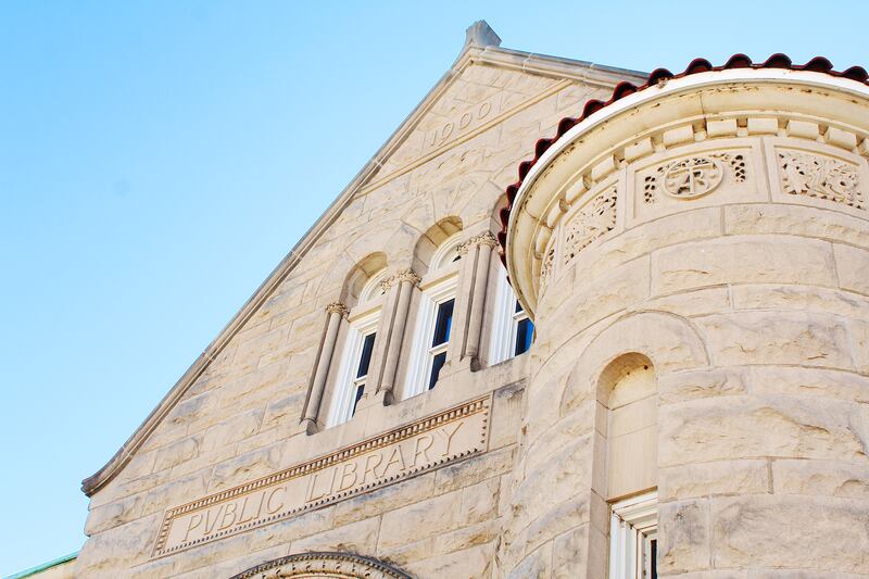 The Dixon Public Library, originally known as the O.B. Dodge Public Library, was constructed throughout the course of 1900, and would open the following year. The year "1900" appears at the top.
