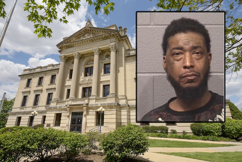 George Davis, 49, of DeKalb, was arrested on July 6, 2025, after police say a woman they saw with blood on her face told them he tried to bite her chin and prevented her from leaving a hotel room. On July 7, 2025, he was charged with multiple felonies and was denied pretrial release, according to records filed in court. (Inset photo provided by DeKalb County Jail)