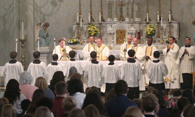 The Most Reverend Bishop Louis Tylka, Bishop of Peoria, and other clergy give Mass to students from Trinity Catholic, Oglesby Holy Family and Peru Catholic Schools during a All Schools Mass on Thursday, Feb. 20, 2025 at St. Patrick's Catholic Church in La Salle. The bishop announced a new name for the three schools calling it Carlo Acutis. Last year, the Catholic Diocese of Peoria announced the consolidation of the three schools. Carlo Acutis Canonization will take place on Sunday, April 27, 2025 during the Jubilee of Teenagers in Rome. Acutis is the first millennial saint, representing those born between the early 1980's and the late 1990's. He is celebrated for cataloging miracles and online and managing websites for Catholic organizations.
