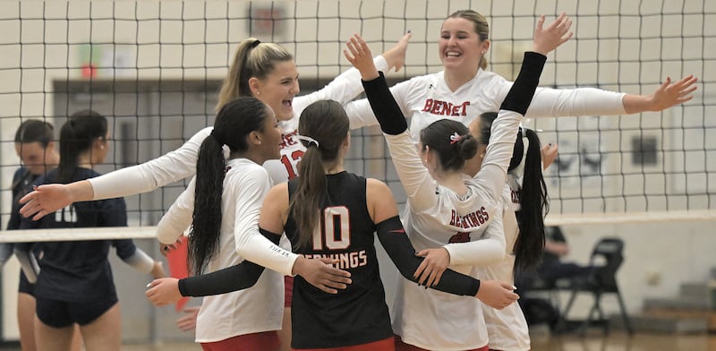 Benet celebrates their two-set win against New Trier in a supersectional girls volleyball match Monday, Nov. 10, 2025 in Bartlett.