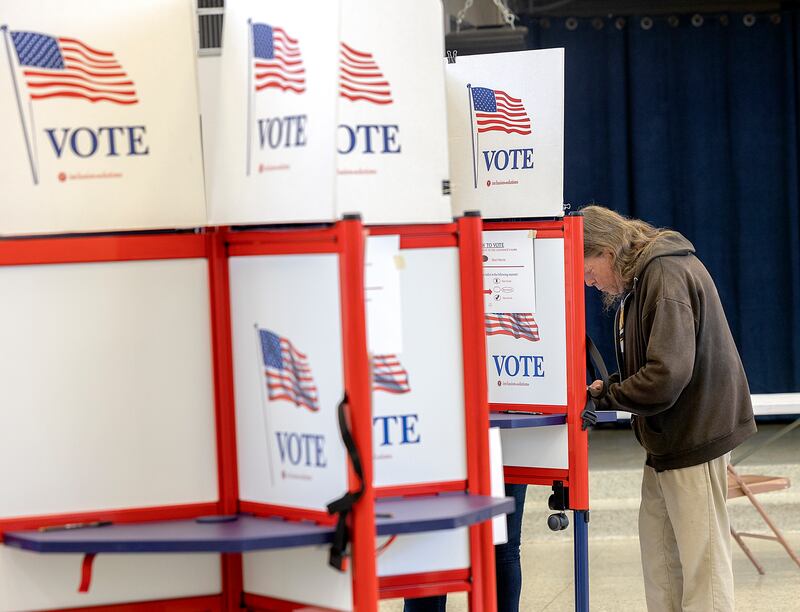 Robert Flowers works on his ballot Tuesday, Nov. 5, 2024, at the Rock Falls Community Center.
