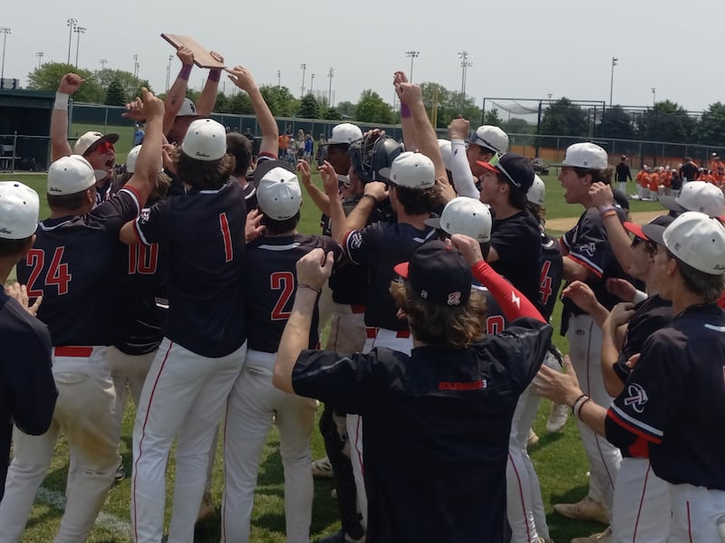 The Bradley-Bourbonnais baseball team celebrates after winning the IHSA Class 4A Normal Community West Regional championship 2-1 over Minooka on May 31, 2025.