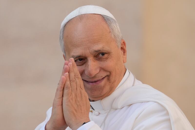 Pope Leo XIV gestures as he arrives for his weekly general audience in St. Peter's Square at The Vatican, Wednesday, Oct.1, 2025. (AP Photo/Gregorio Borgia)