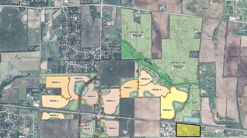 The yellow property outlined in black at the bottom right is a 25-acre parcel at the corner of Brundige and Keslinger roads that District 304 owns. The draft agreement would allow Shodeen Group to use that property for a utility easement to get water service to the proposed development.