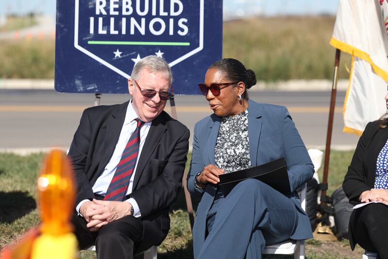 Illinois State Senator Dick Durbin and Lieutenant Governor of Illinois Julian Stratton talk at the ribbon cutting for the opening of the I-55 and IL 59 interchange on Monday, Oct. 7, 2024 in Joliet.