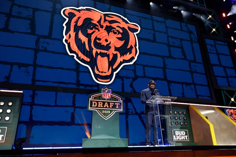 Former Chicago Bears player Dez White announces a pick during the second round of the NFL football draft, Friday, April 25, 2025 in Green Bay. (AP Photo/Tyler Kaufman)