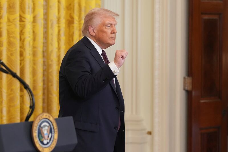 President Donald Trump gestures as he departs a reception celebrating Greek Independence Day in the East Room of the White House, Monday, March 24, 2025, in Washington. (AP Photo/Jacquelyn Martin)