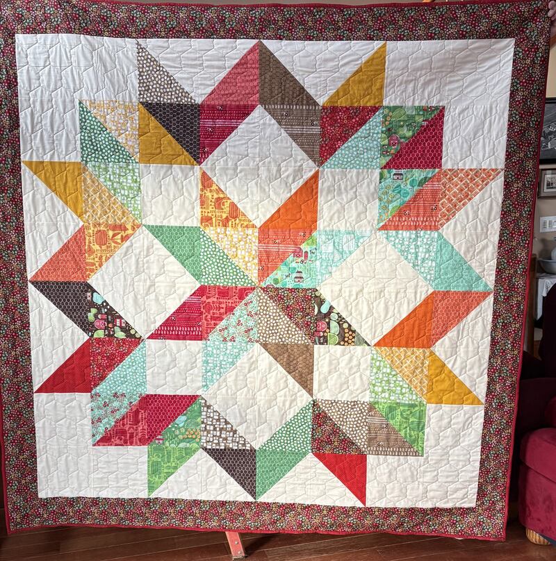 This is the quilt being raffled by the Leaf River Merry Martha Club. It is a generous 81 inches square and features fabrics that are 100 percent cotton from Farm Fun, a collection designed by Stacy Lest Hsu for world class textile manufacturer, Moda Fabrics.