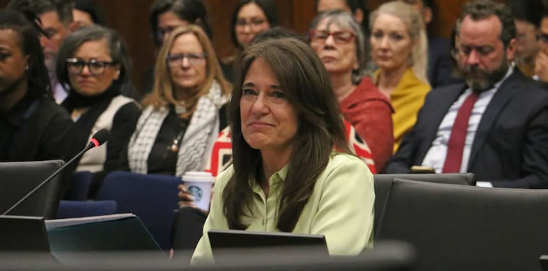 Denise Lorence, mother of Katie Abraham, says during an April 27 hearing of the Illinois Accountability Commission that her daughter should be remembered as the “empathetic and caring person she was,” not used to further the Trump administration’s political aims.