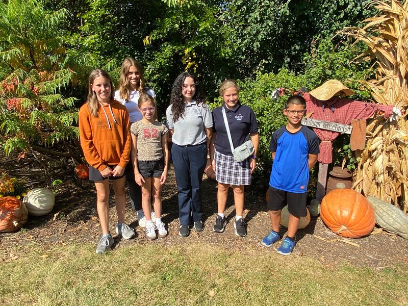Winners of the 2025 Sycamore Kiwanis Club’s Junior Marshal Essay Contest for Sycamore Pumpkin Fest pose for a photo at Johnson's Pumpkin Patch off Illinois Route 64 on Friday, Oct. 3, 2025. (From left): Aida Doty, 13; Evelyn Hall, 13; Quinn Oncken, 11; Annabelle Vega, 13; Amelia Ballerini, 12; and David Orellana, 11.