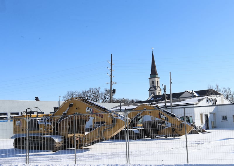 Excavators and other demolition equipment are moved in behind old Immaculate Conception Catholic Church on Monday, Jan. 26, 2026 in Streator. Last August, The Streator City Council approved a TIF Redevelopment Agreement with Beck Oil Company to open a gas station with a car wash in the 400 block of North Park Street. Crews will be demolishing the Immaculate Conception Catholic Church next month. The church held its last service in 2010.