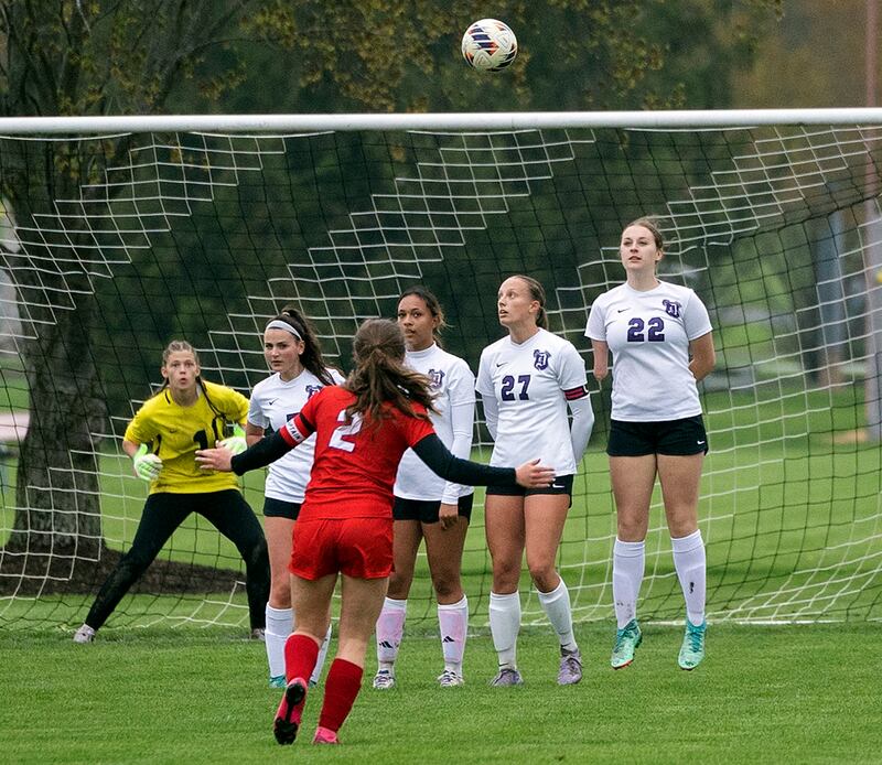 Oregon’s Anna Stender puts the ball up and over the Dixon defense for a goal Thursday, May 1, 2025.
