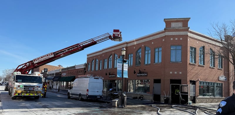 Firefighters continue to investigate a fire that caused an estimated $100,000 in smoke and water damage Wednesday morning to HopScotch and Vine restaurant in downtown Plainfield and nearby businesses.