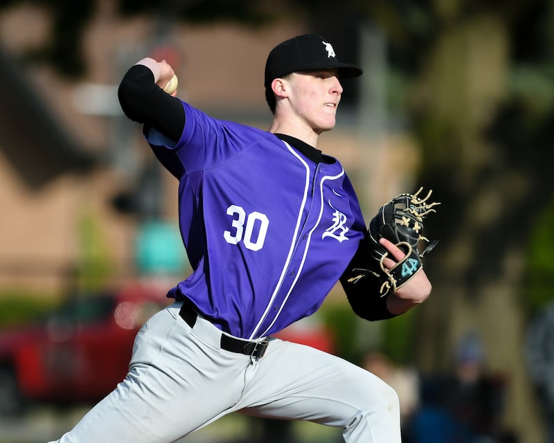 Downers Grove North's Colin Doyle (30) pitches during the game on Monday May 19, 2025, while taking on York High School in Elmhurst.
