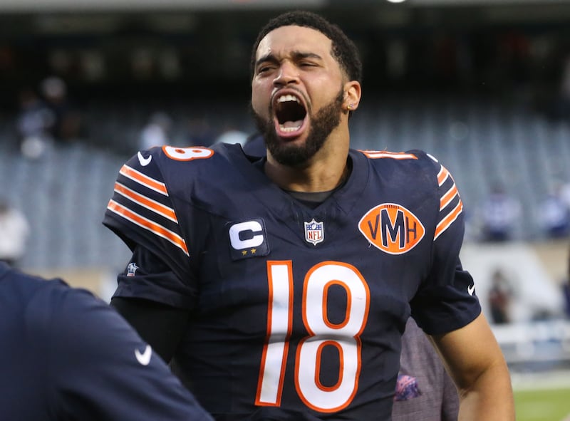 Chicago Bears quarterback Caleb Williams reacts while running off of the field after beating the Dallas Cowboys on Sunday, Sept. 21, 2025 at Soldier Field.