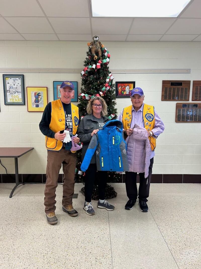The Rochelle Lions Club recently donated new winter coats, hats and gloves to Lincoln Elementary school. Pictured from left to right are: Lion Rick Cogswell, District 231 Counselor Erin Strouss and Lion Kevin Zilm.