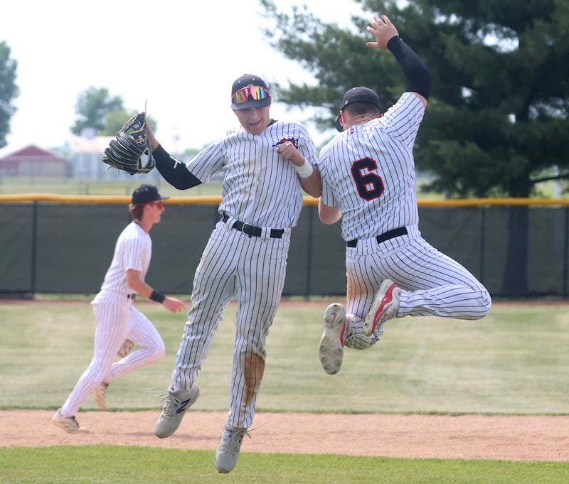 Fulton's Will Borgman and teammate Mason Kuebel leap in the air after defeating Parkview Christian during the Class 1A Sectional semifinal game on Wednesday, June 3, 2026 at Putnam County High School.