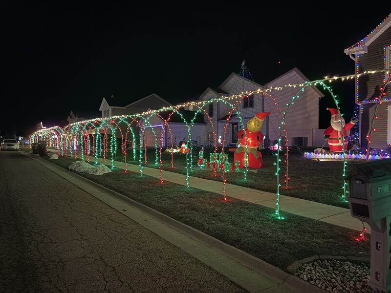 A view of Christmas decorations lining the sidewalk on the 800 block of Banbury Drive in Ottawa on Sunday, Dec. 21.