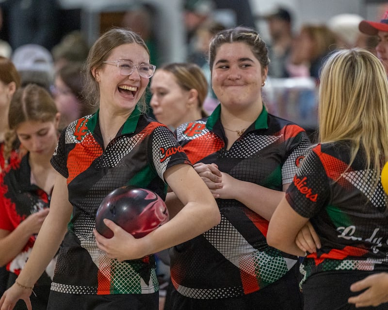 Leah Ricci of LaSalle-Peru laughs with teammates at the L-P Cavalier Classic on Saturday, December 20, 2025 at Super Bowl in Peru.