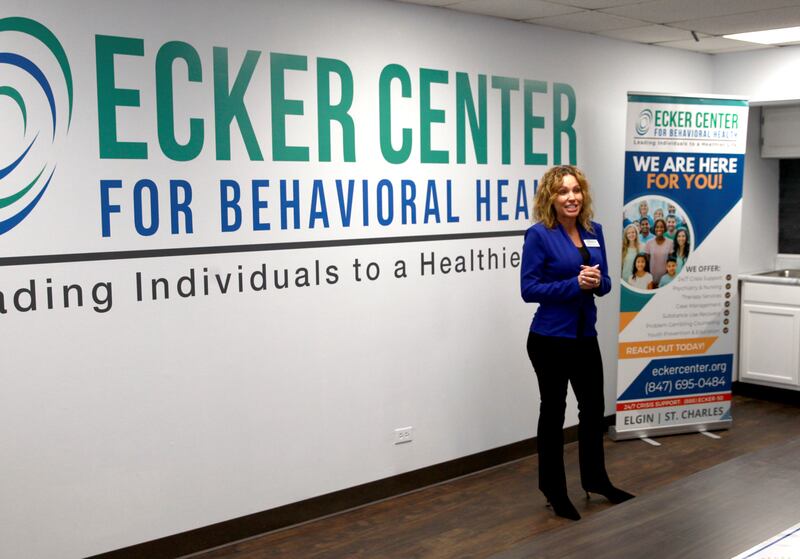 Dr. Daphne Sandouka, CEO of Ecker Center for Behavioral Health, talks to partners from Rotary District 6440 after being presented a $5,000 grant aimed at enhancing mental health services. Rotary Clubs participating in the initiative include Elgin Breakfast Rotary Club, Rotary Club of Elgin (Noon), Batavia Illinois Rotary Club, Rotary Club of Bartlett, and St. Charles Breakfast Rotary Club.