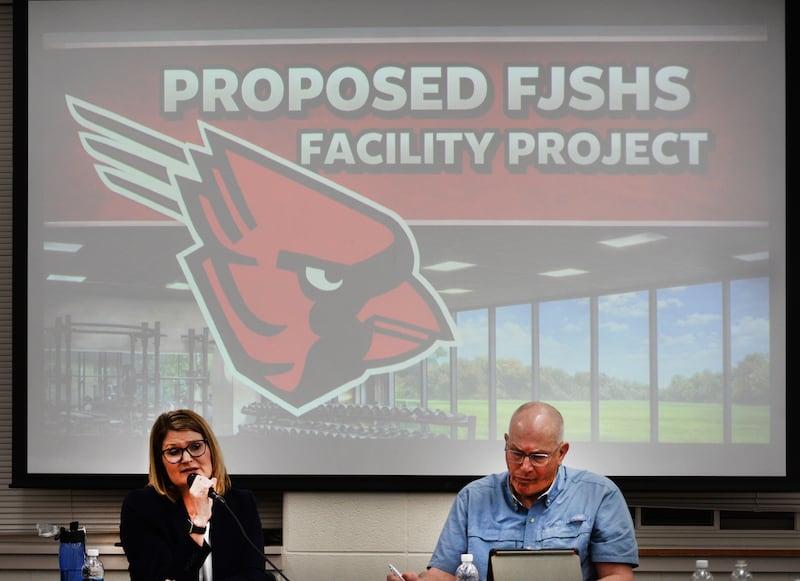 Forrestville School Board president Chip Braker (right) and Superintendent Sheri Smith lead the April 15, 2026 public hearing about selling bonds to fund a $10 million sports complex addition for the Forreston Junior Senior High School.