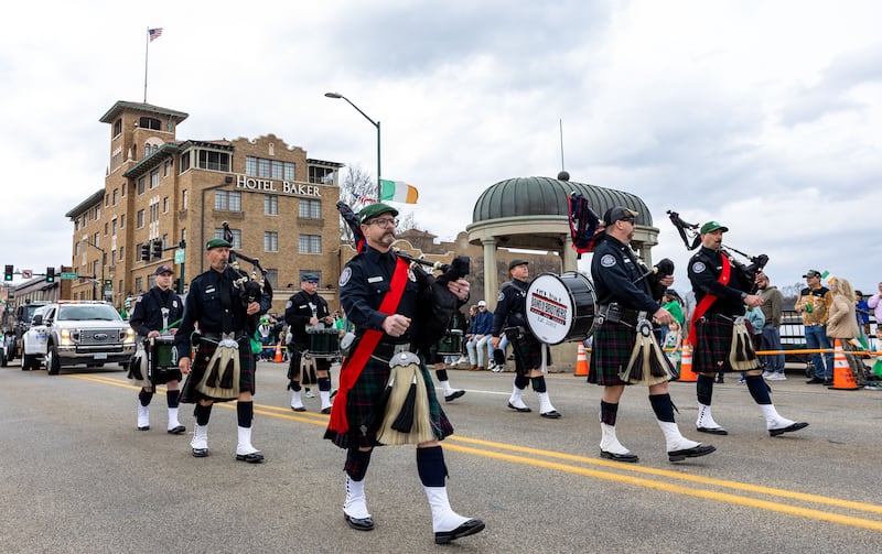 Band of Brothers Pipes and Drums marches down Main Street in St. Charles during the St. Charles St. Patrick’s Parade on Saturday, March 15, 2025.