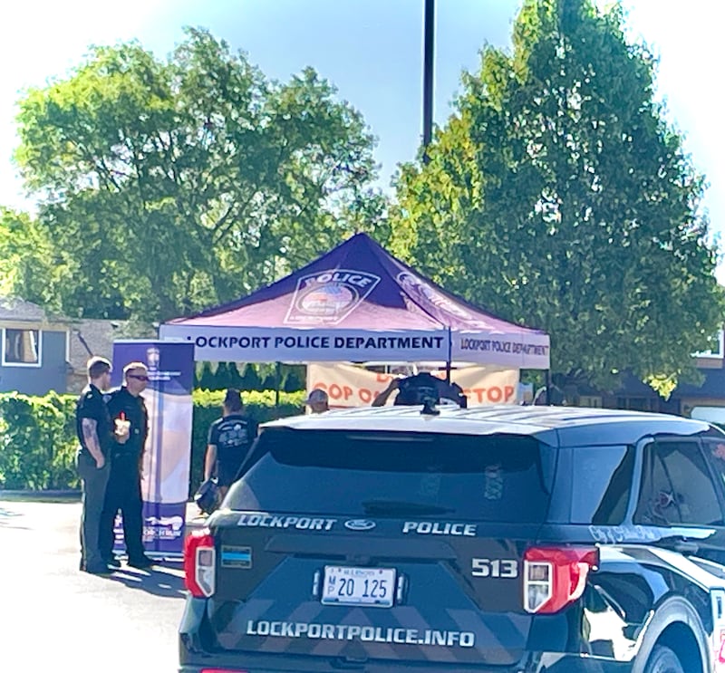Lockport police are out at the Dunkin’ at 1069 E. 9th St. in Lockport for the  ‘Cop on a Rooftop’ fundraiser for Special Olympics Illinois on Friday, May 16, 2025. Law enforcement across Illinois are participating in this annual event.