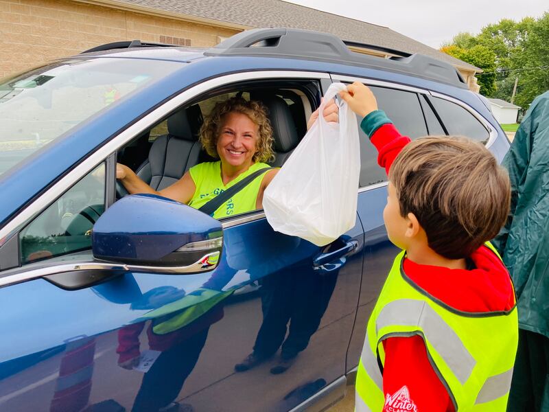 The Granville Knights of Columbus will host a drive-thru fish fry from 4:30 to 7 p.m. Friday, March 24, at the Sacred Heart Church Hall, 311 Hennepin St., Granville. Katie Wujek getting a carry out from Elijah Gross.